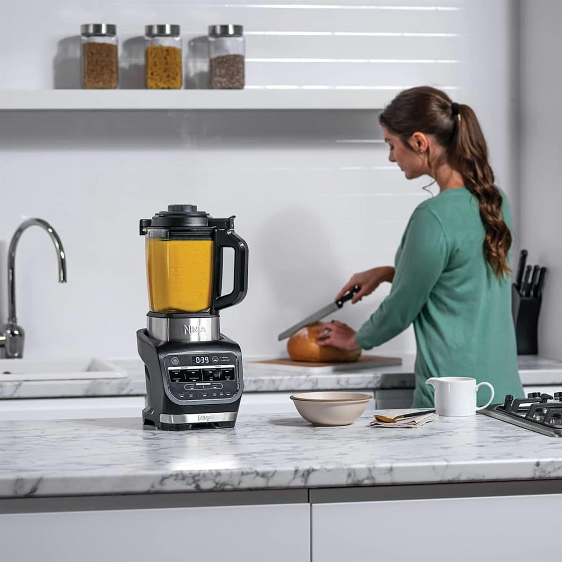Hot soup ready in the jug of the Ninja Foodi Blender and Soup Maker in the kitchen