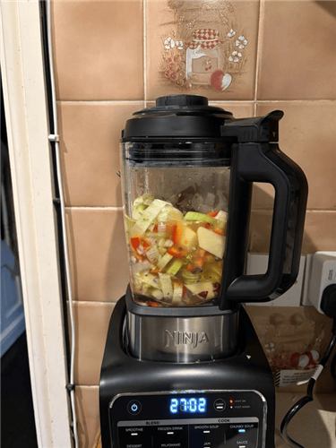 Chopped vegetables in the Ninja Foodi Blender and Soup Maker jug before cooking